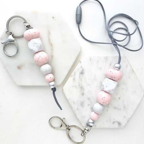 The Keys to Success • Pink & White Granite